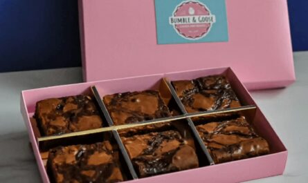 a pink custom brownie box with 6 delicious brownies